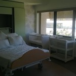 Birth suite with bed, cot & change table